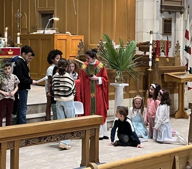 Kids are sorrounded to Rev. Irina